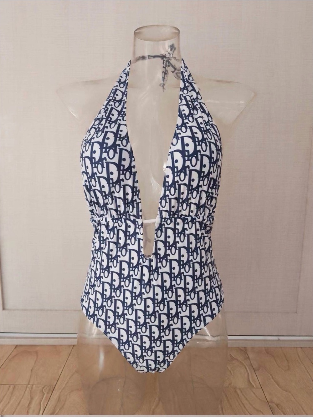 A Classy Chic Boutique Navy and White Halter One-Piece Swim